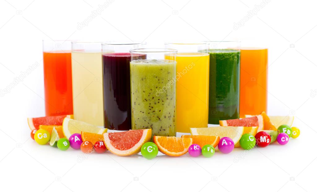 various fresh healthy fruits juices in glasses arranged on white background 