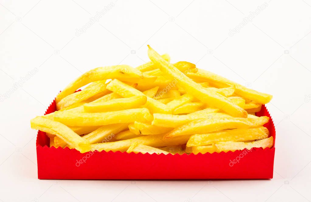 close up view of cooked french fries on white background