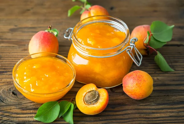 Homemade apricot jam in the jar and bowl