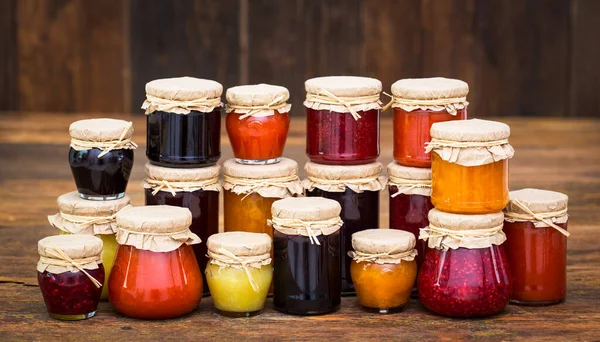 Various homemade fruit jam in the jars