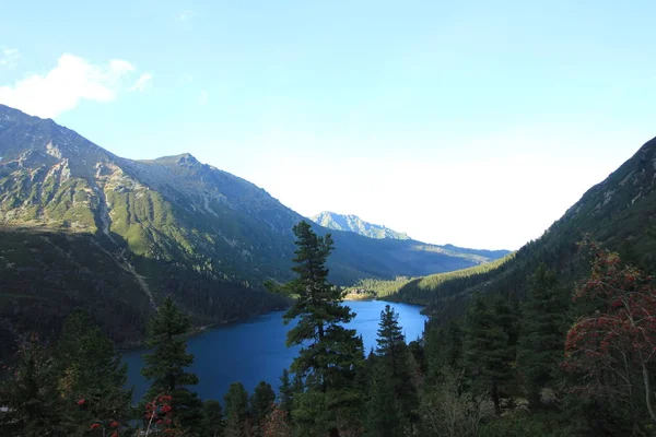 Picturesque  mountain lake Sea Eye, the Fish Brook Valley/Poland - 10.06.2018. Morskie Oko is the largest and fourth-deepest lake in the Rybi Potok Valley. The Tatra National Park (near Zakopane). View from above.