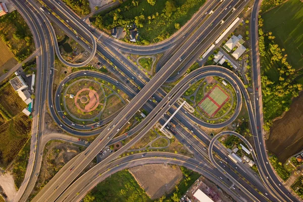 Aerial view of highway junctions. Bridge roads shape number 8 or — Stock Photo, Image