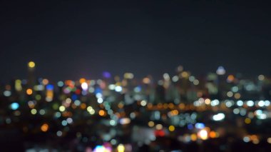 Işıklar ile şehirde gökdelen binaların Bokeh arka plan, Bl