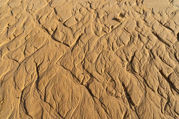 Close up of brown wave sand or rock pattern texture background o