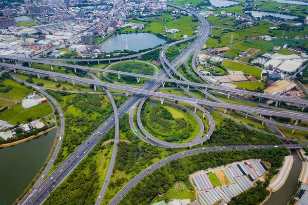 Aerial view of highway junctions. Bridge roads shape number 8 or — Stock Photo, Image