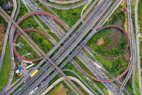 Aerial view of highway junctions. Bridge roads shape number 8 or