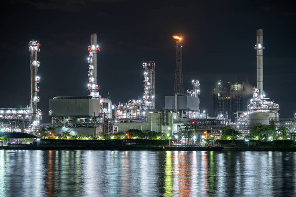 Petrochemical oil refinery and sea in industrial engineering con