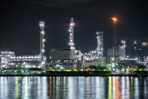 Petrochemical oil refinery and sea in industrial engineering con