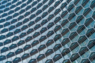 Ofis binaları. Fütüristik tec altıgen pencerelerin yapısı