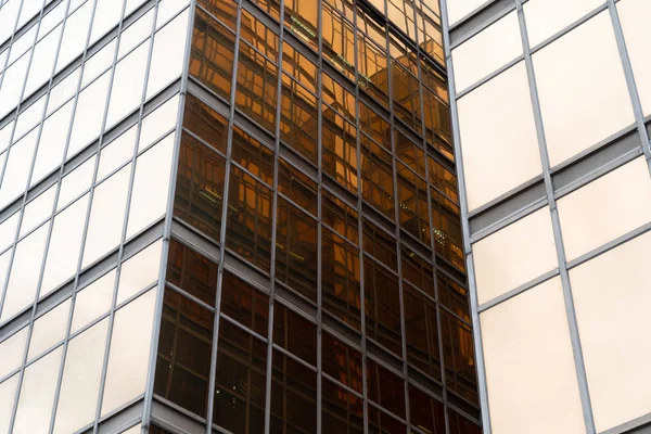 Golden building. Windows glass of modern office skyscrapers in t — Stock Photo, Image