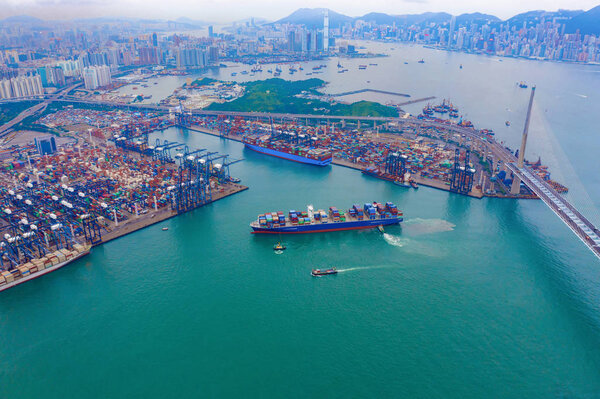 Aerial top view of container cargo ship in the export and import