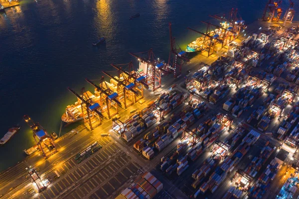 Vista superior aérea del buque de carga de contenedores en la exportación e importación — Foto de Stock