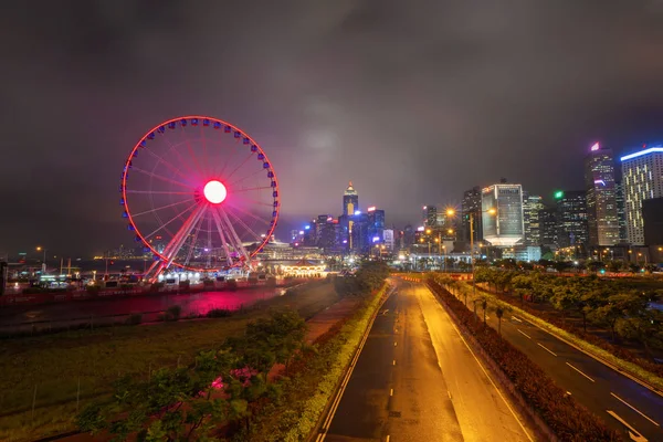 A roda gigante, Hong Kong Observation Wheel, e diversão par — Fotografia de Stock