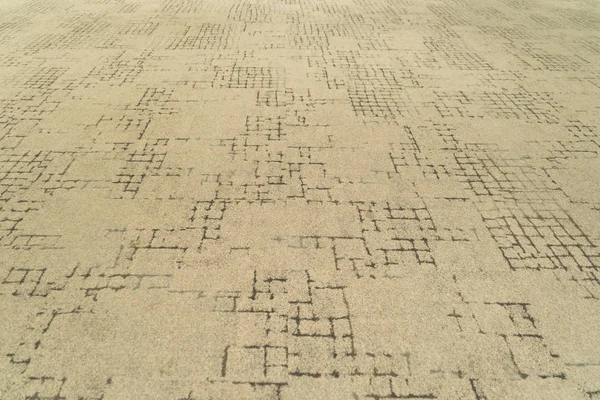 Moderne beige Teppichgewebe Bodenmuster Oberflächenstruktur in o — Stockfoto