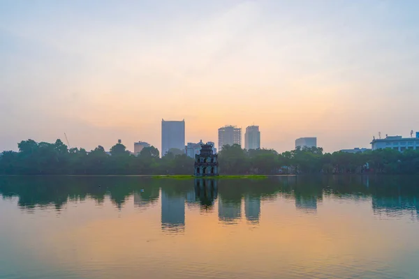 Turtle tower with modern skyscraper buildings and reflection in — Stock Photo, Image