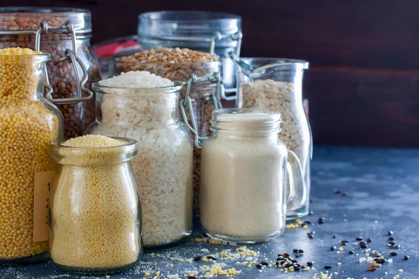 Various Cereals Glass Jars Rice Millet Oatmeal Couscous Buckwheat Semolina — Stock Photo, Image