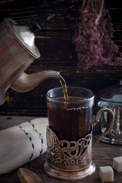 Old Vintage Tea Kettle Pours Black Tea Glass Beaker Metal — Stock Photo, Image