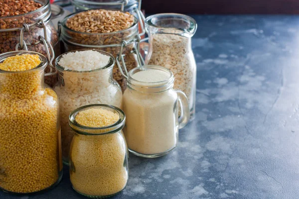 Various Cereals Glass Jars Rice Millet Oatmeal Couscous Buckwheat Semolina — Stock Photo, Image