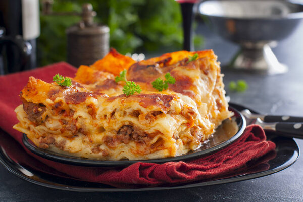 Traditional Italian Lasagna Bolognese with minced meat and tomato sauce, horizontal