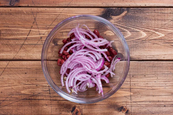 Step by Step Cooking Salad with Red Beans and Beef - Step 2: Add red salad chopped onion, top view, horizontal