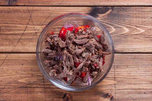 Step-by-step cooking salad with red beans and beef - step 5 adding boiled beef, top view, horizontal