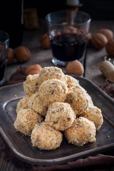 Snack cheese balls with prunes and walnuts, selective focus — Stock Photo, Image