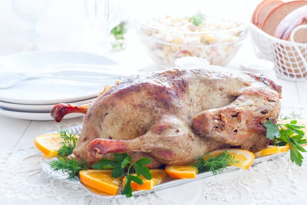 Festive stuffed oranges duck on a dish, horizontal — Stock Photo, Image