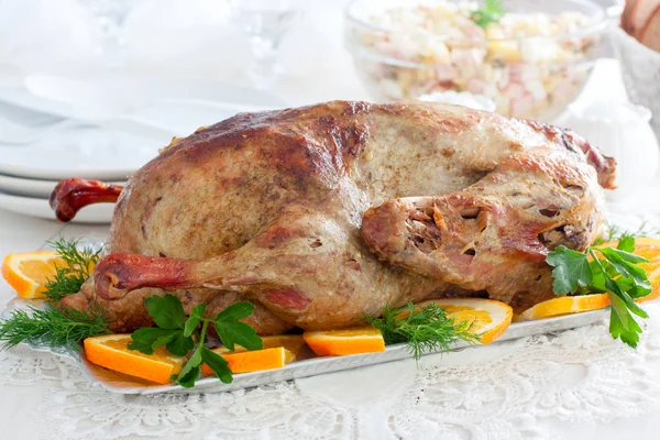 Festive stuffed oranges duck on a dish, horizontal — Stock Photo, Image