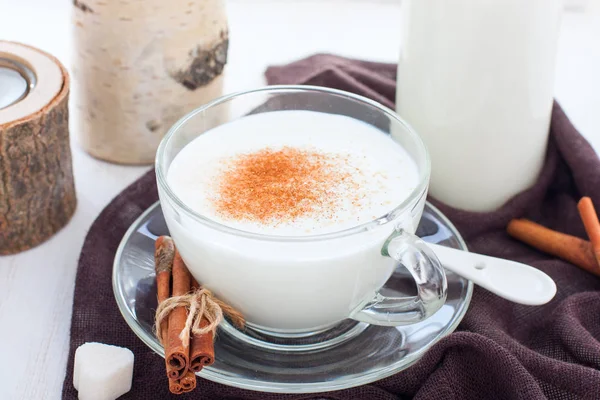 Homemade kefir in a glass cup with cinnamon and sugar, horizontal — Stock Photo, Image