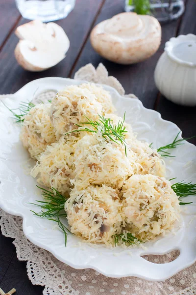 Salad with mushrooms in the form of balls in cheese, rafaello, selective focus — Stock Photo, Image