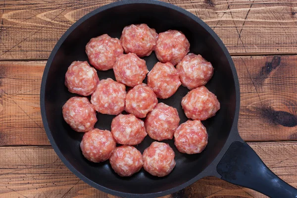 Step by Step Cooking Meatballs with Rice in Tomato Sauce with Vegetable Salads - Step 3 - Forming Raw Meatballs, Top View, Horizontal