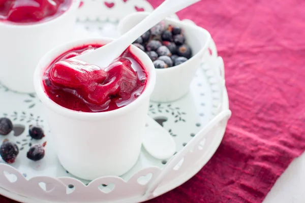Blackcurrant sorbet in white cups, selective focus — Stock Photo, Image