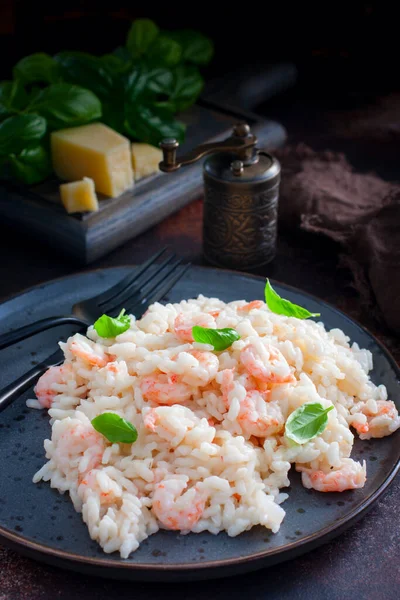 Shrimp risotto with cream sauce, selective focus