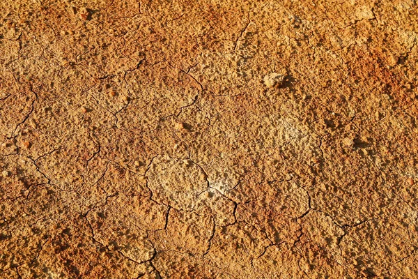 Dry Polluted Orange Stony Soil Top View — Stock Photo, Image