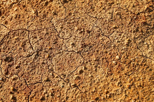 Dry Polluted Orange Stony Soil Top View — Stock Photo, Image