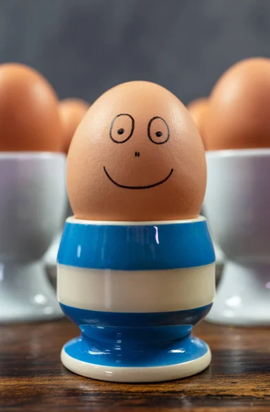 Happy Emotion Concept One Individual Boiled Egg Smiling Different Blue — Stock Photo, Image