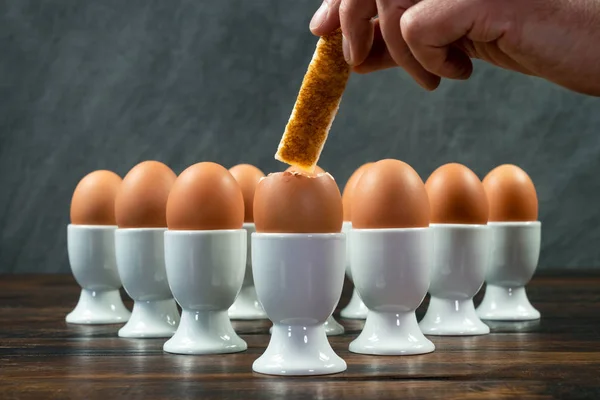 Person Dipping Toast Soldier One Boiled Egg Group Eggs White — Stock Photo, Image