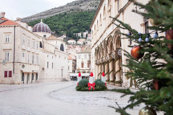 Christmas tree and street decoration in old town of Dubrovnik, Croatia. Amazing ancient architecture, cathedral, square