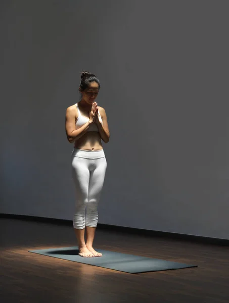 Asian chinese single woman in white practising Yoga — Stock Photo, Image