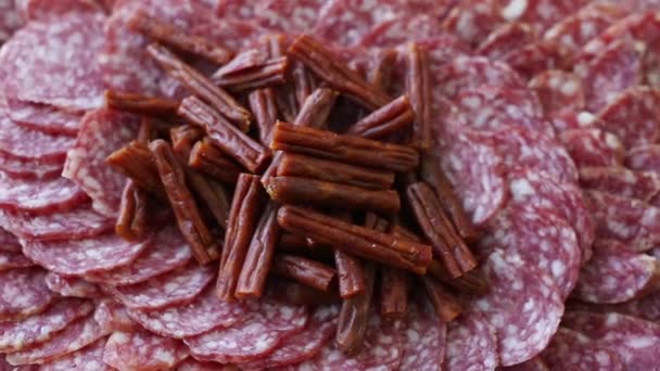Food background of cured sausage. Sausage Slices — Stock Video