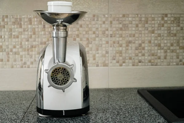 Meat grinder in modern kitchen. Close up — Stock Photo, Image