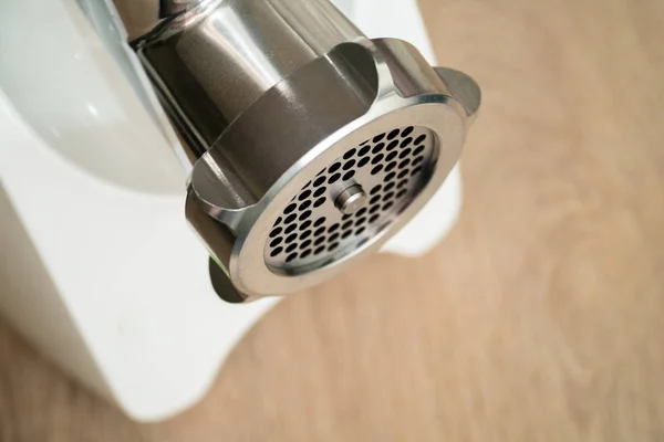 White meat grinder on a tabletop. Meat grinder in modern kitchen — Stock Photo, Image