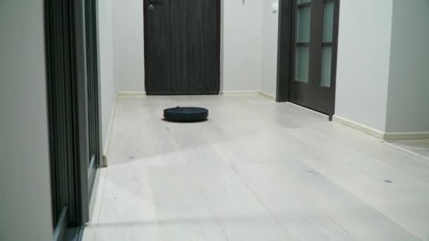 Robotic Vacuum Cleaner On Laminate Wood Floor Smart Cleaning