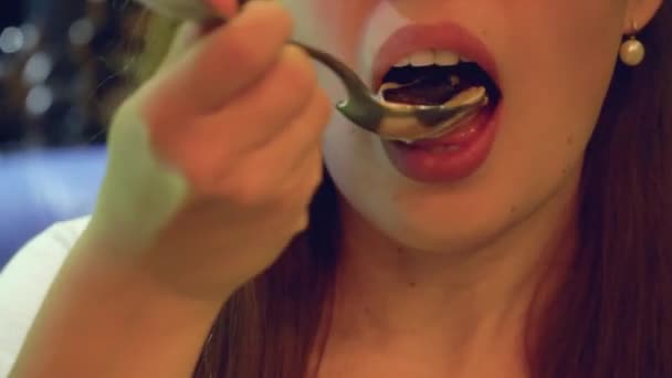 Young woman eating mussel soup at luxury restaurant — Stock Video