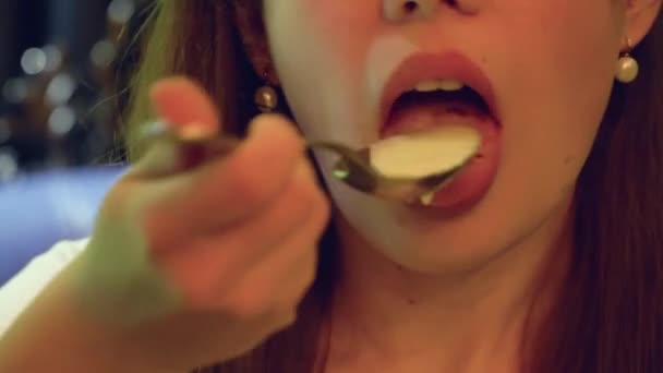 Young woman eating soup at luxury restaurant — Stock Video