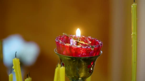 Candle light close up in church — Stock Video