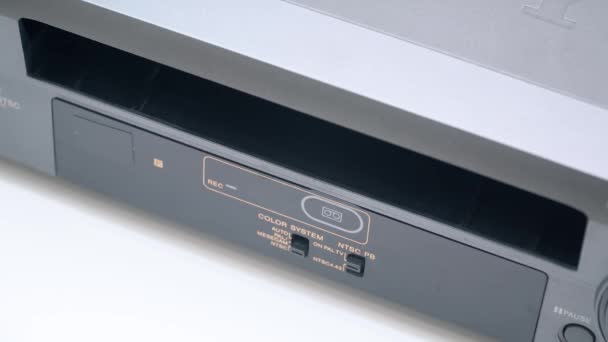 Video cassette is unloaded from VCR. Videorecorder VHS — Stock Video