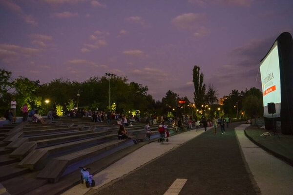 29 August 2017-Bucharest, Romania. The movie under the stars event, created by the city hall in the park Moghiorosh. You can see a projection screen and people waiting for it to start