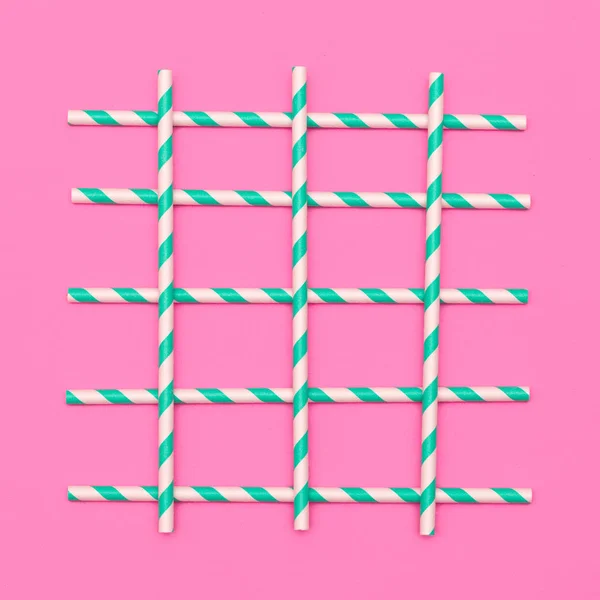 鸡尾酒管粉红色糖果最小概念艺术 — 图库照片