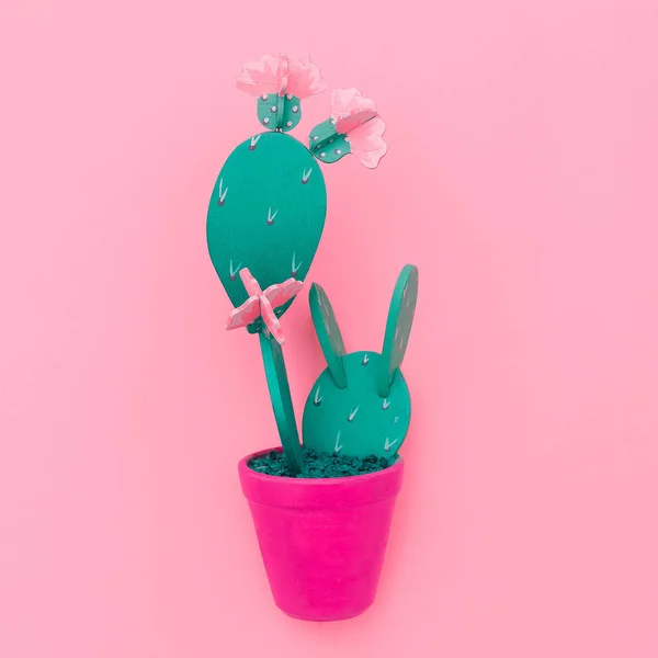 Wooden cactus on pink background. Plants on pink concept. Minima